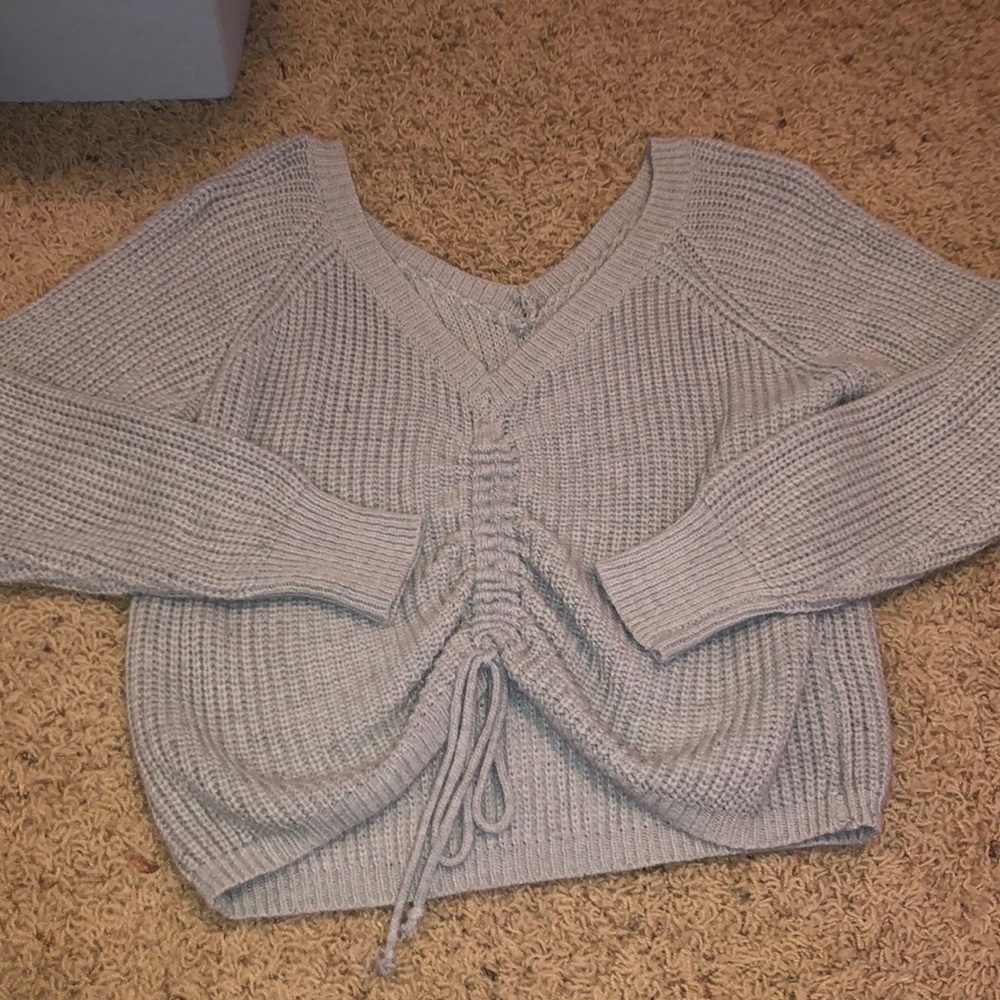 Light gray sweater